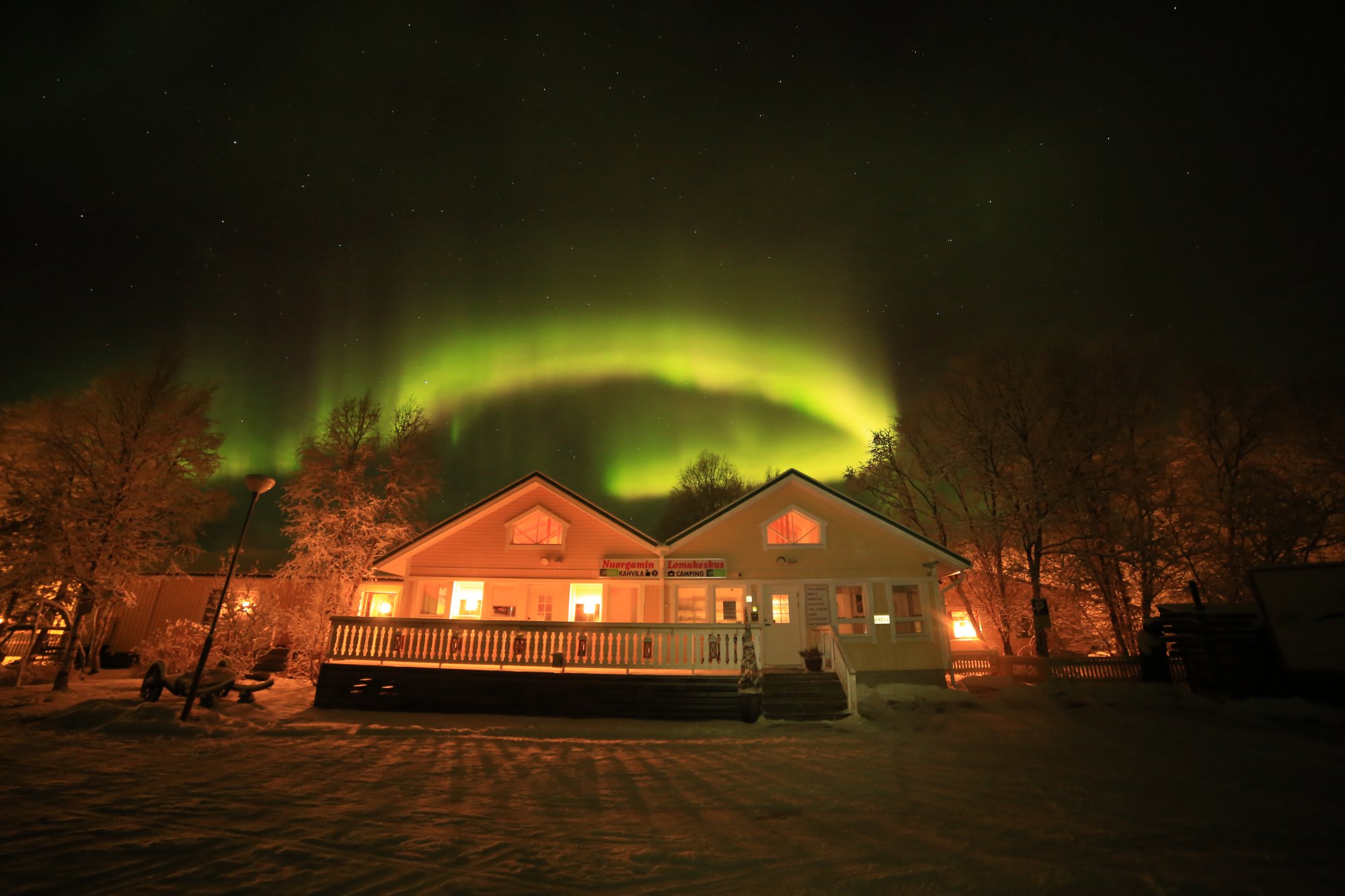 Nothern lights over Nuorgam Holiday Village in Finland
